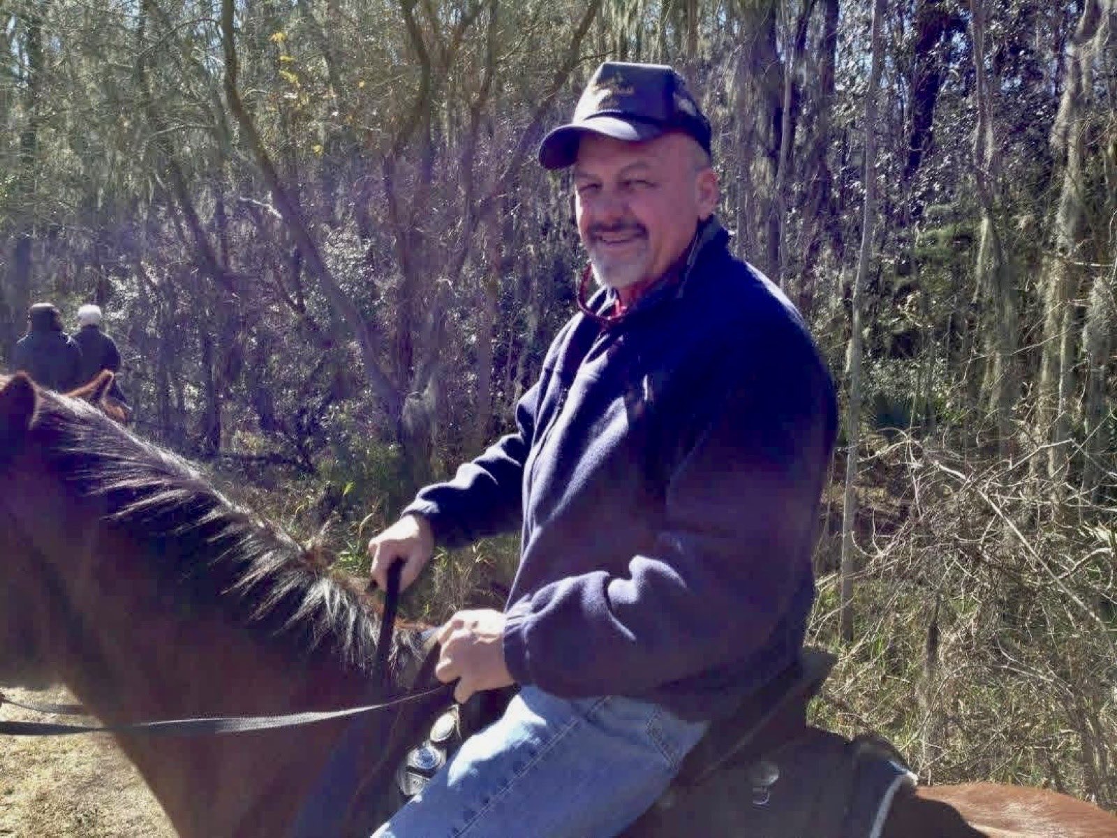 Larry Hoover on horseback